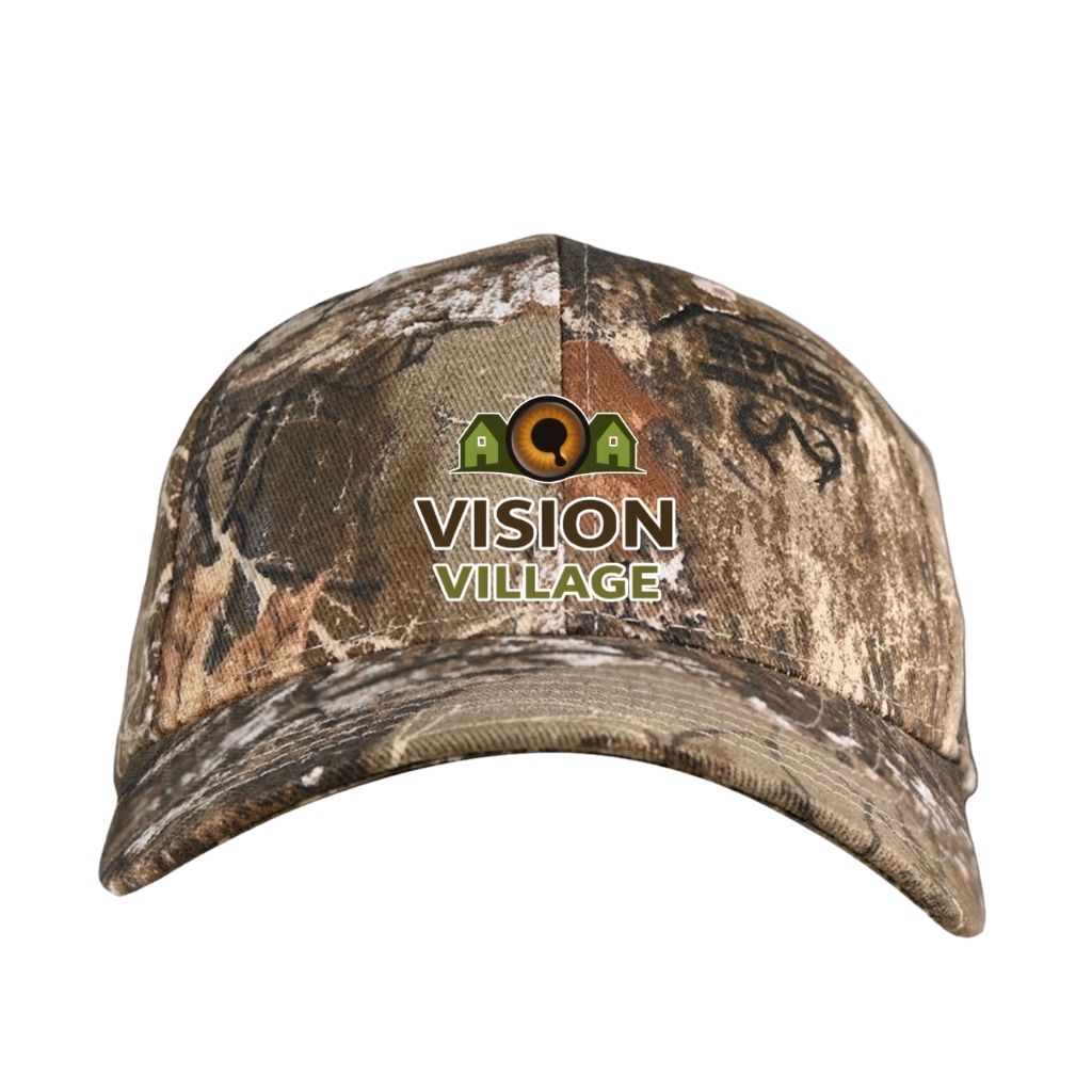 Real Tree Edge hat with the vision village logo on the front