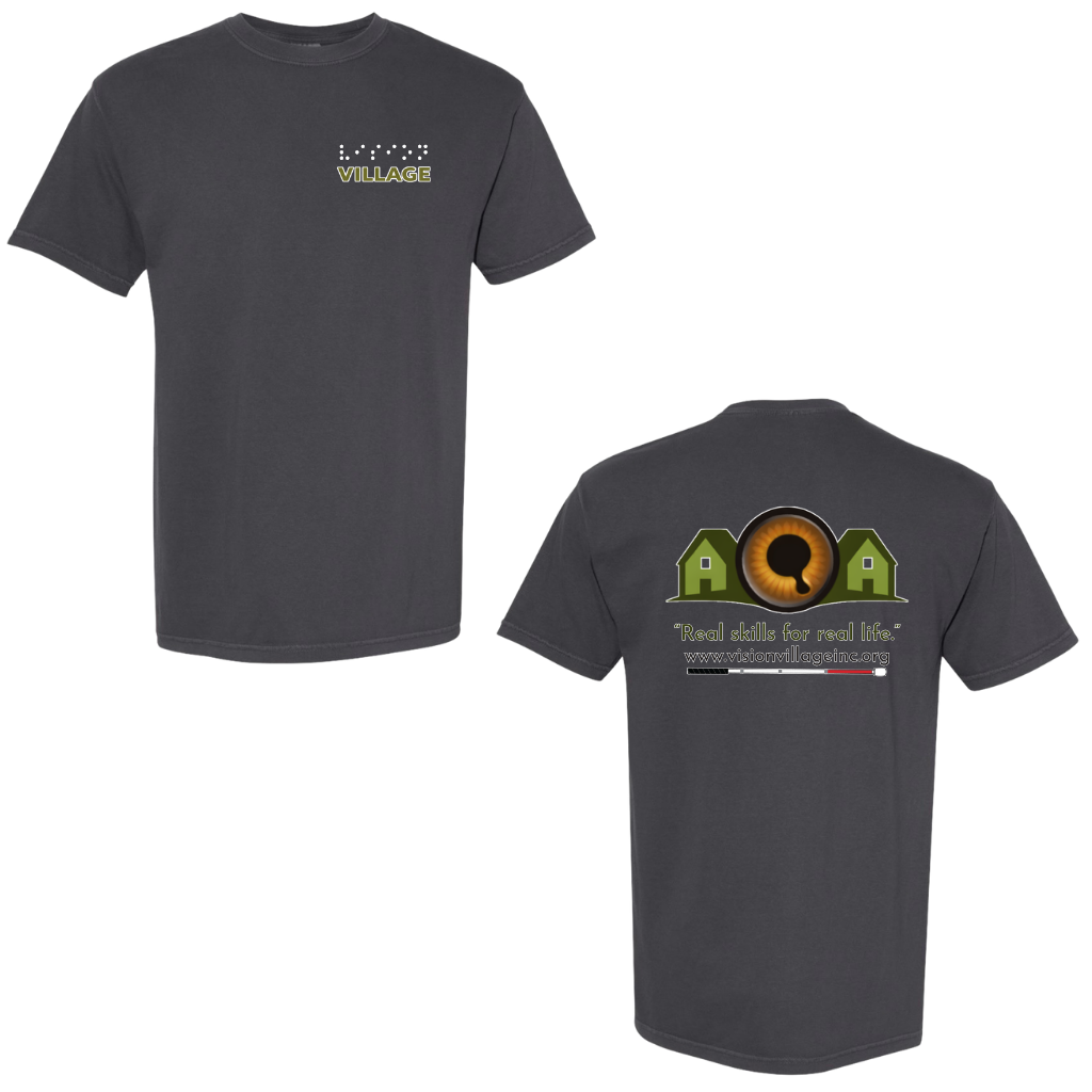 Graphite t-shirt with left chest graphic on the front that has the word vision in braille and the word village in print. The back has the Vision Village logo with the words “real skills for real life” underneath. Below that is the non-profit’s email address, www.visionvillageinc.org, and a graphic of a white cane.