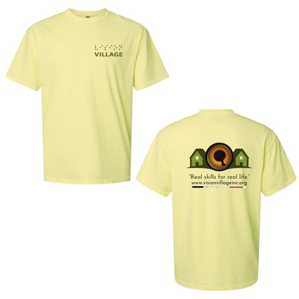 Neon lemon t-shirt with left chest graphic on the front that has the word vision in braille and the word village in print. The back has the Vision Village logo with the words “real skills for real life” underneath. Below that is the non-profit’s email address, www.visionvillageinc.org, and a graphic of a white cane.