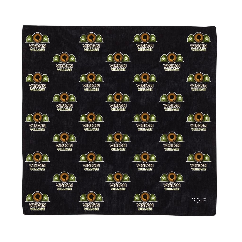 Black bandana, small vision village logos with paw prints all over it and the word dog in braille in the bottom right corner
